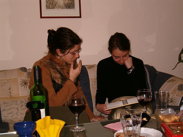 Joana and Sasha watching pictures.